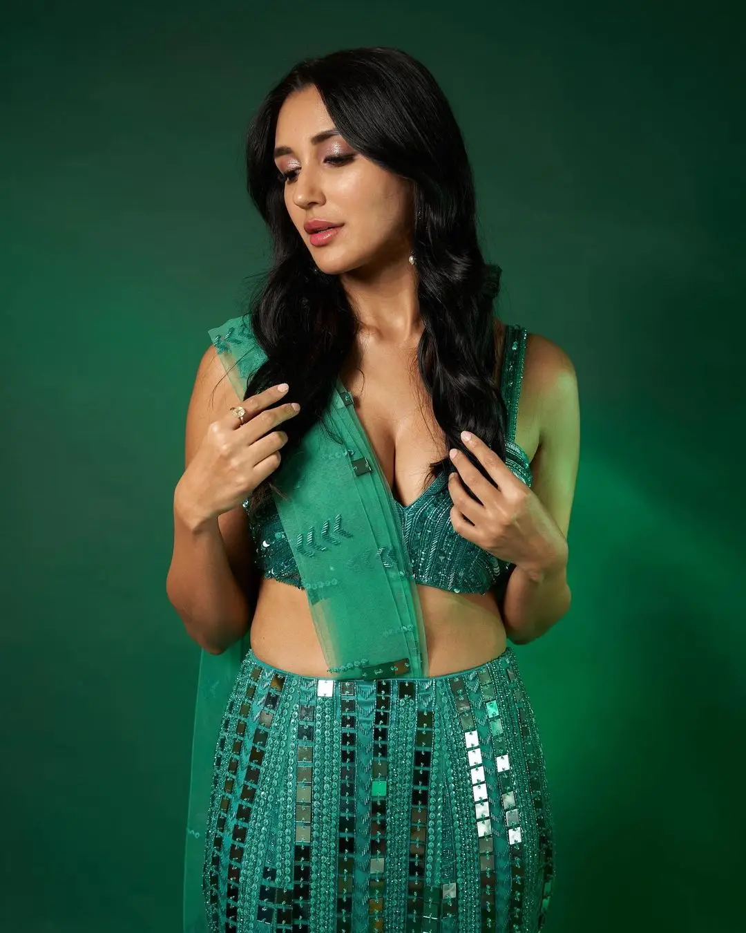 Bollywood Actress Nikita Dutta Images In Green Lehenga Choli